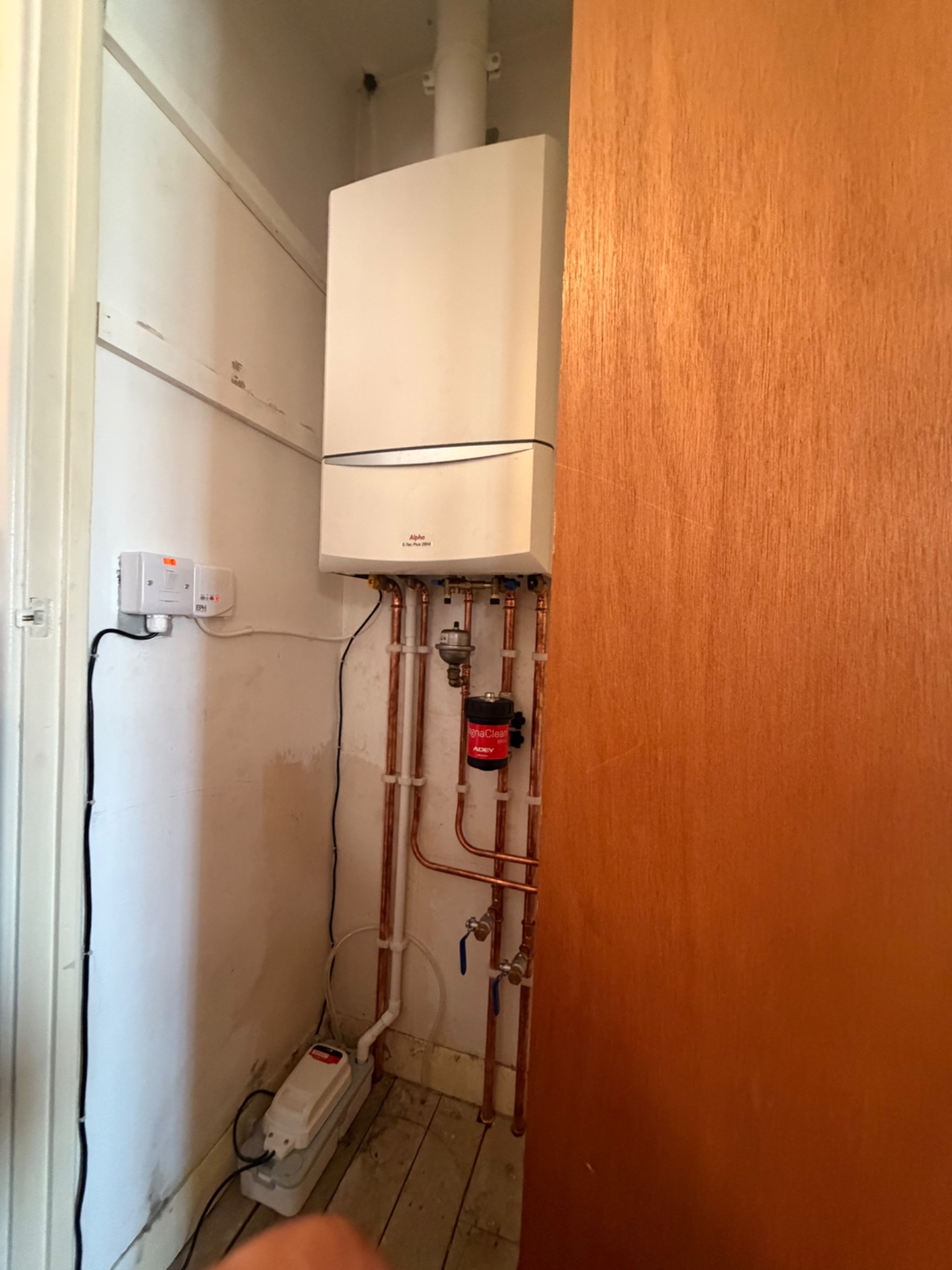 New Alpha E-Tec Plus combi boiler installed in the airing cupboard with a system filter, Darlington